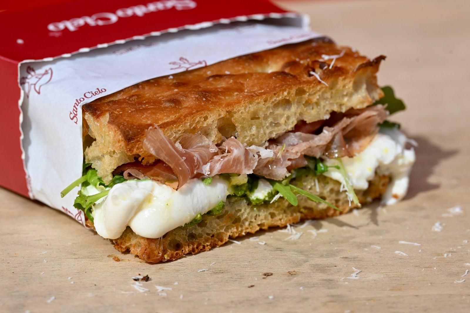 The Santo Special up close: burrata, prosciutto and rocket in a red Santo Cielo box